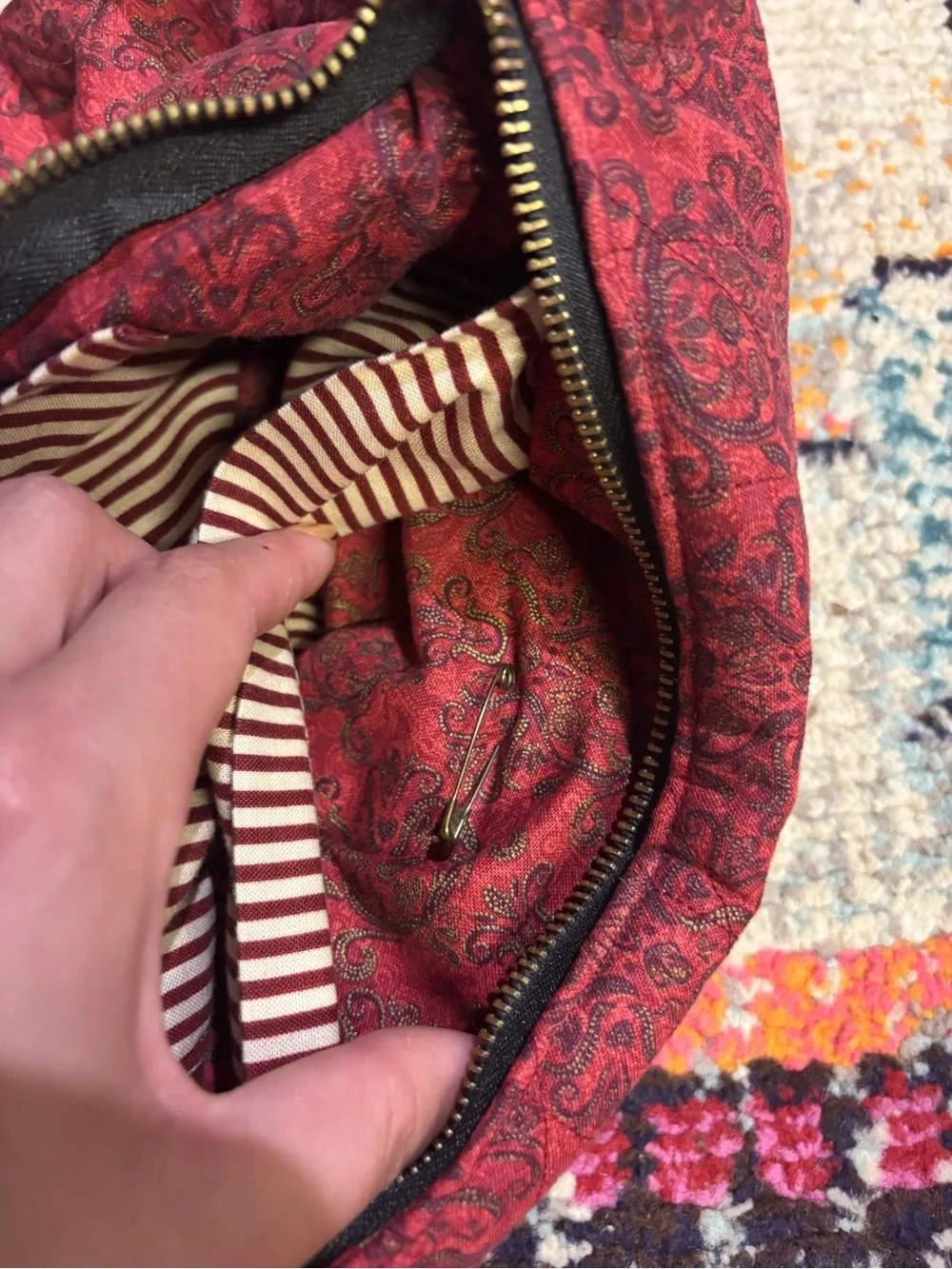 Quilted Red Pattern Shoulder Bag with Decorative Medallion